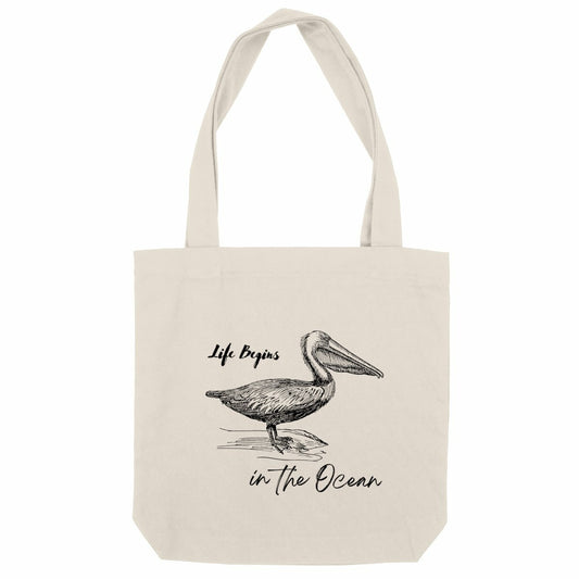 Tote bag recyclé Life Begins in the Ocean avec illustration pélican